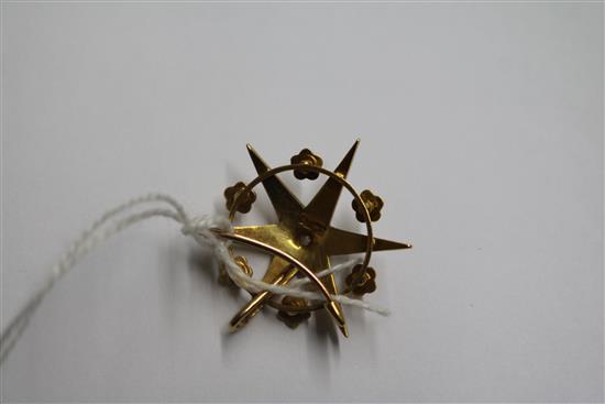 A Victorian 18ct gold, split pearl and diamond set starburst pendant brooch, 28mm.